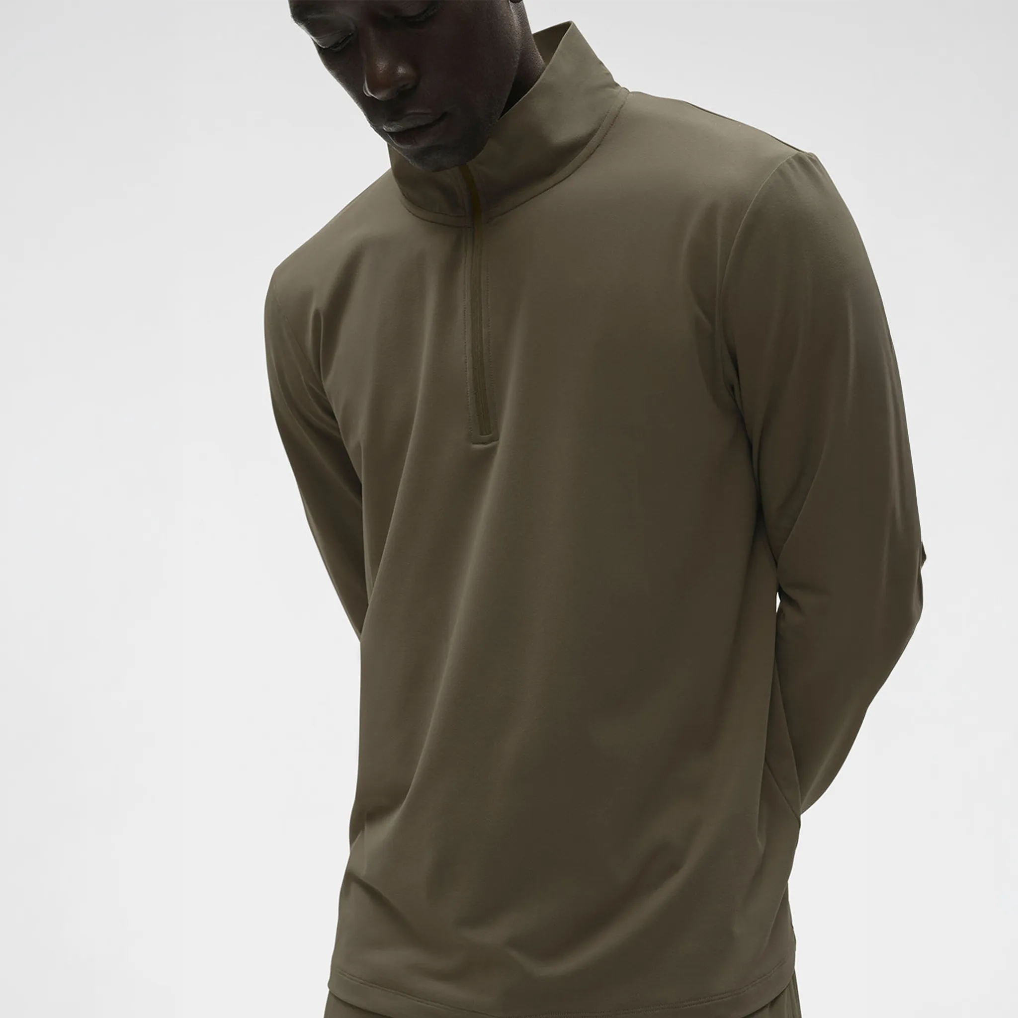 Front Detailed View of Alo Yoga Conquer Reform Olive Tree L/S 1/4 Zip